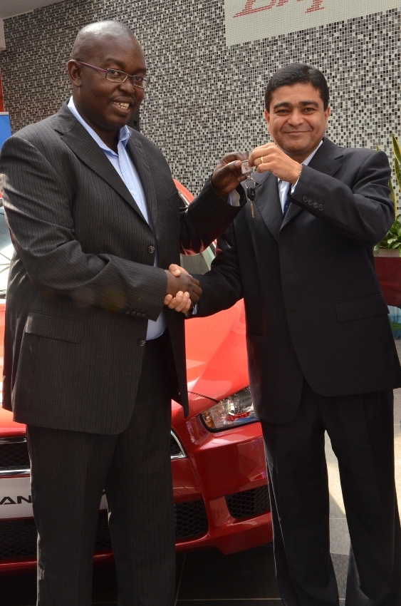 Danny Mucira, MultiChoice Kenya General Manager (left) and Mr. Dinesh Kotecha, Simba Colt Executive Director