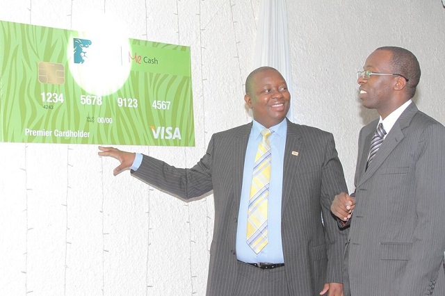 KCB Group Chief Business Officer and MD Kenya Mr. Samuel Makome unveils the new pre-paid debit card KCB MeCash 