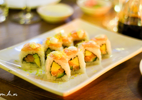 Lemon Salmon Roll, A California roll-style sushi with rice, fresh salmon & zesty lemon mayo.