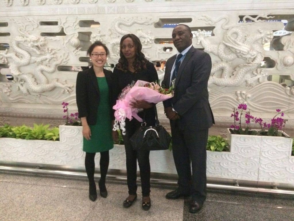Sevelyn Kinya being received at the Beijing Internal Airport